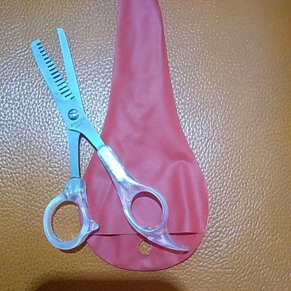 Gunting penipis rambut zigzag