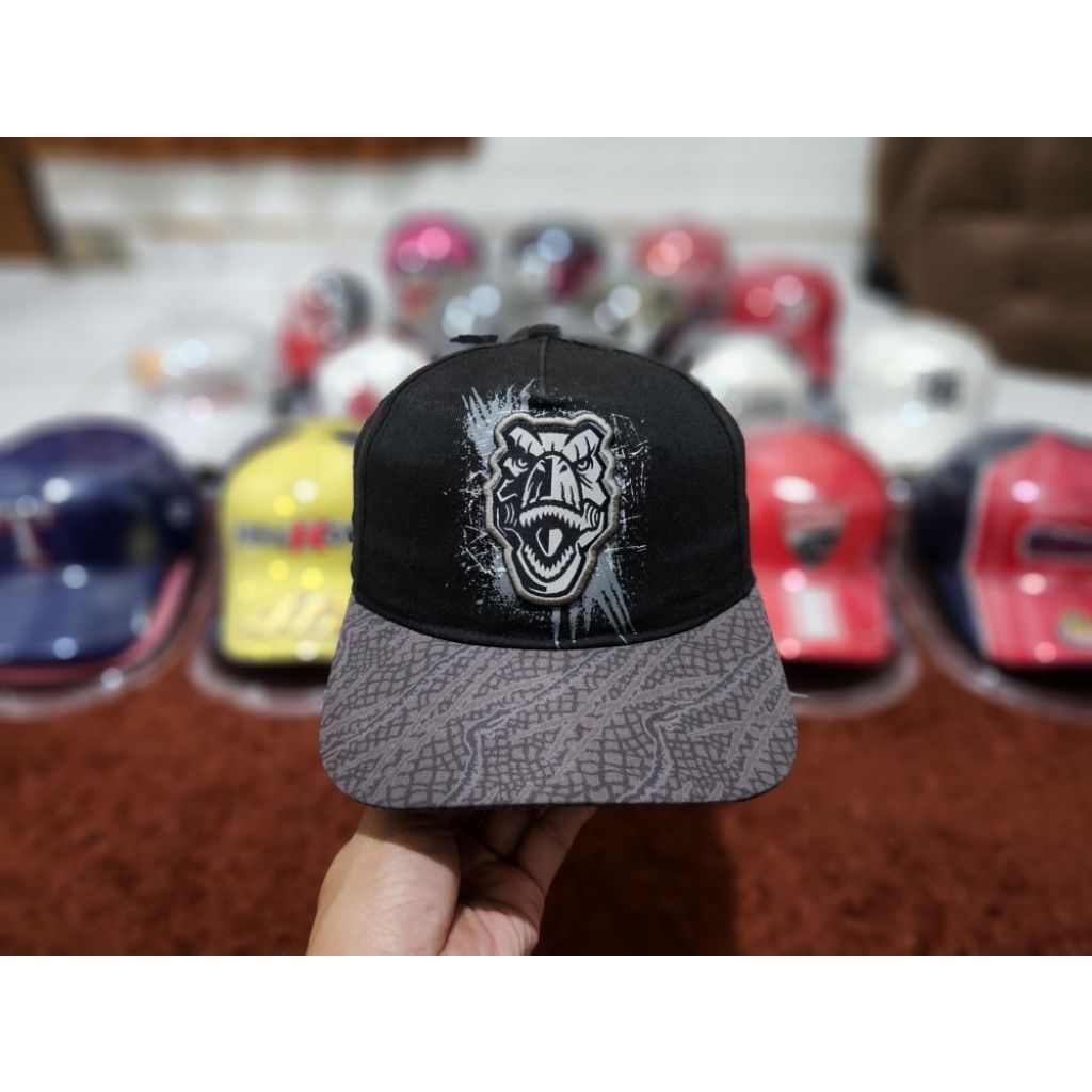 Topi Jurassic World Official