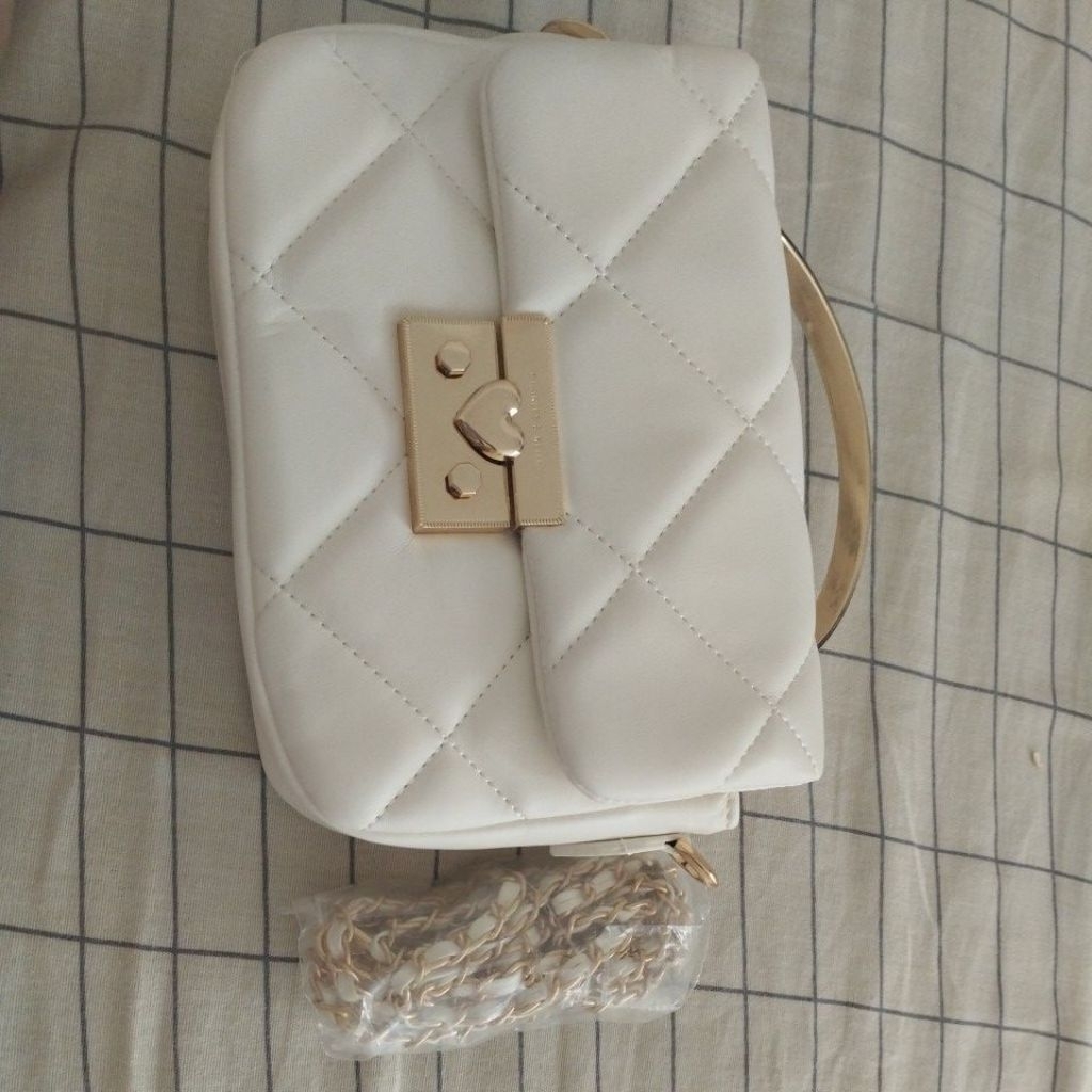 charles n keith tas pesta