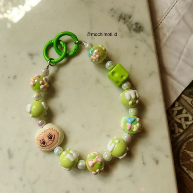 Gantungan HP/ Tas Labubu Green (defect)- Premium beads, setiap pembelian gratis 1 kertas mika untuk 