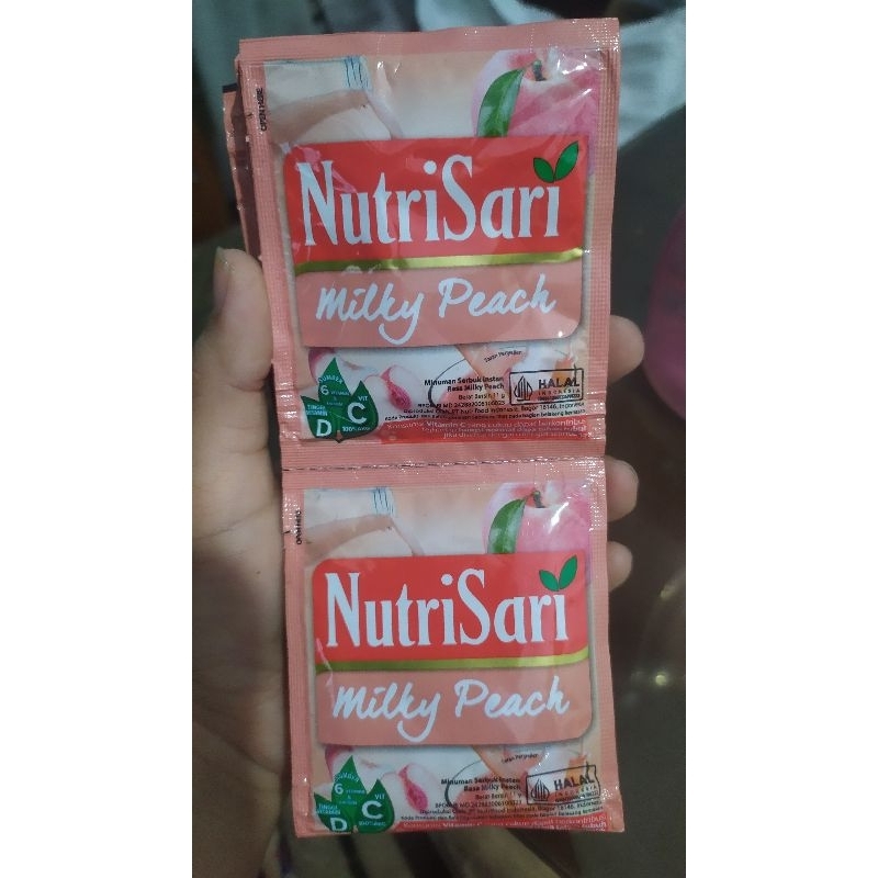 

Nutrisari Milky Peach 1 Renteng isi 10 Sachet