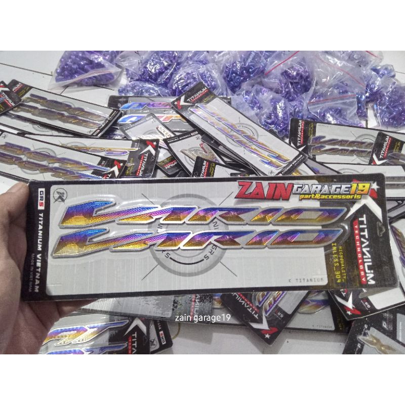 emblem vario titanium.kiri kanan
