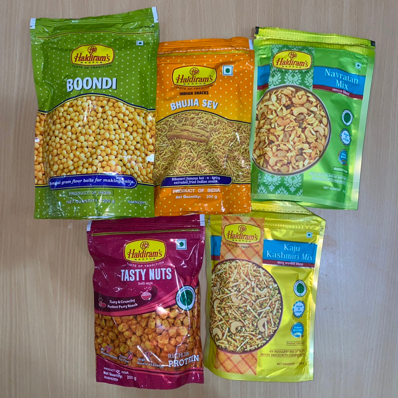 

Haldiram’s Snacks Boondi / Bhujia Sev / Lite Chiwda / Nutty craze / Mini Samosa / Gol Kachauri / Tasty Nuts / Navratan Mix / Kaju Kashmiri Mix (200 grams) (Haldiram’s Nagpur)