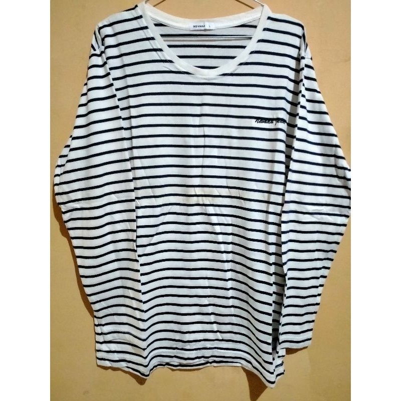 kaos nevada hitam putih