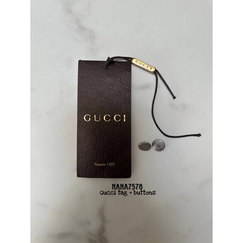

Gucci tag