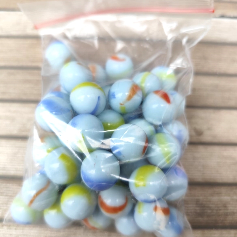 Kelereng Putih Susu Lolipop - Kelereng gundu murah Kelereng Putih Susu Lolipop Kelereng Susu Lolipop