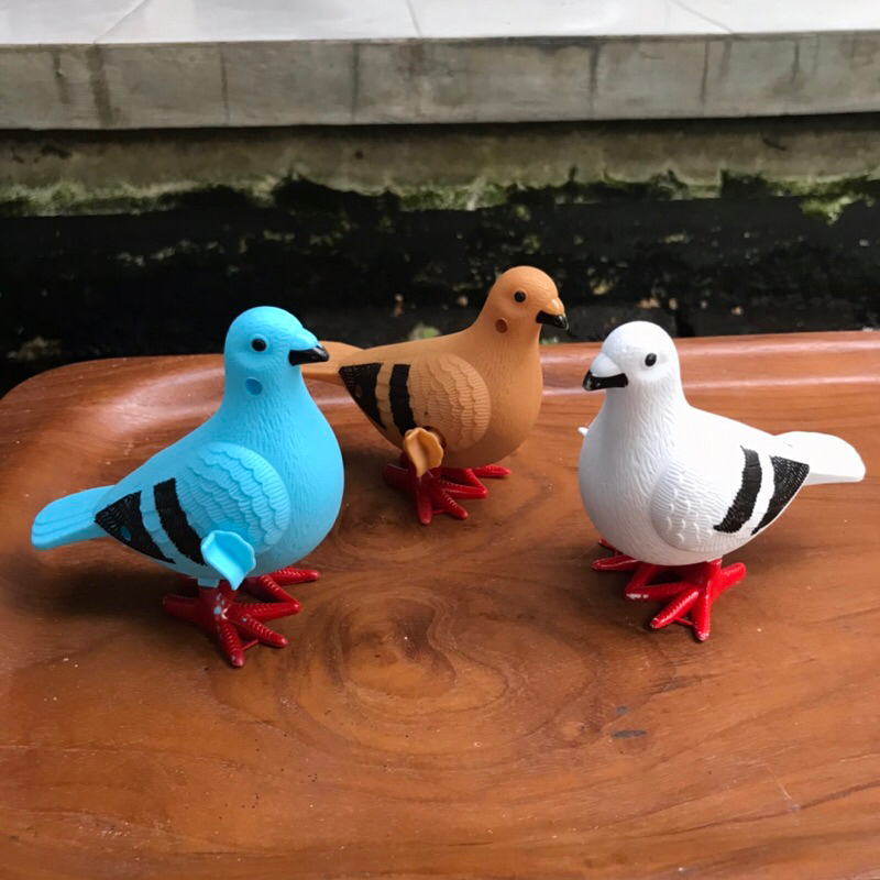 Mainan burung dara putar loncat loncat