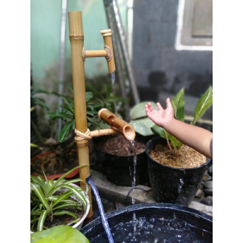 Hiasan taman minimalis_kolam air mancur ikan hias