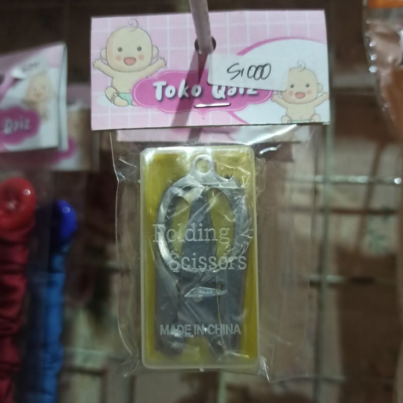 

Gunting Lipat