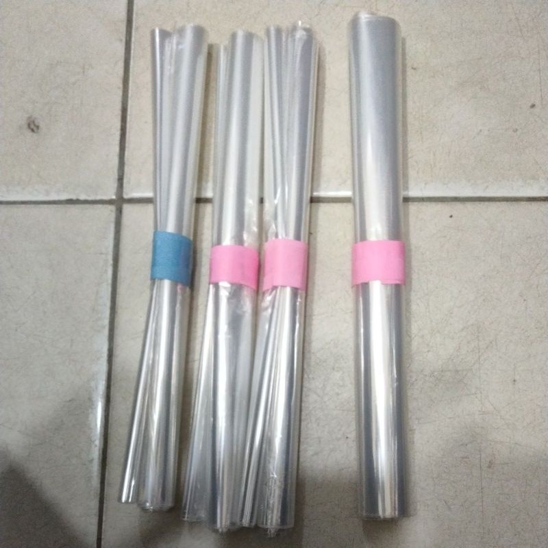 

(1 gulung) sampul plastik buku tulis 10 lembar