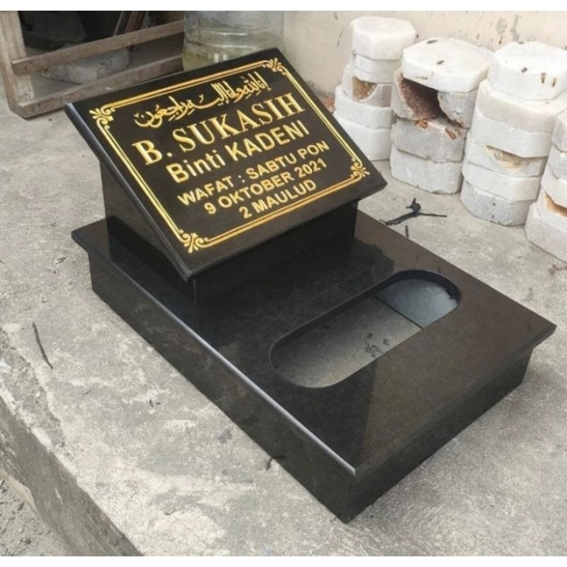 nisan makam batu granit