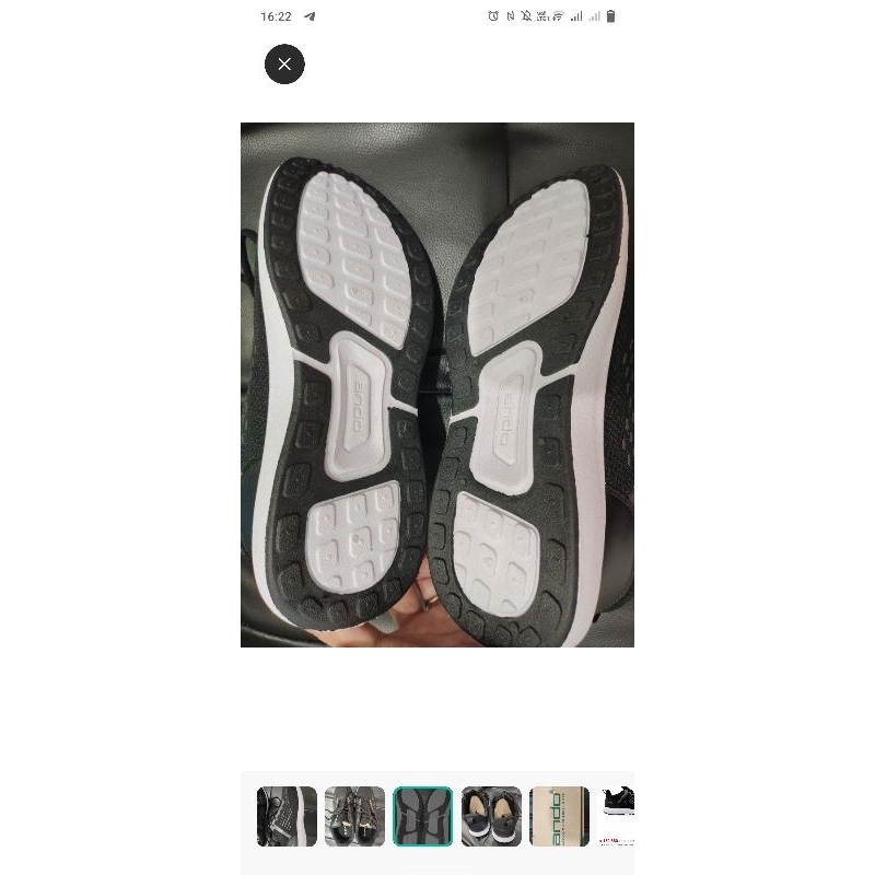 Sepatu Ando hitam. Sneakers merek ando