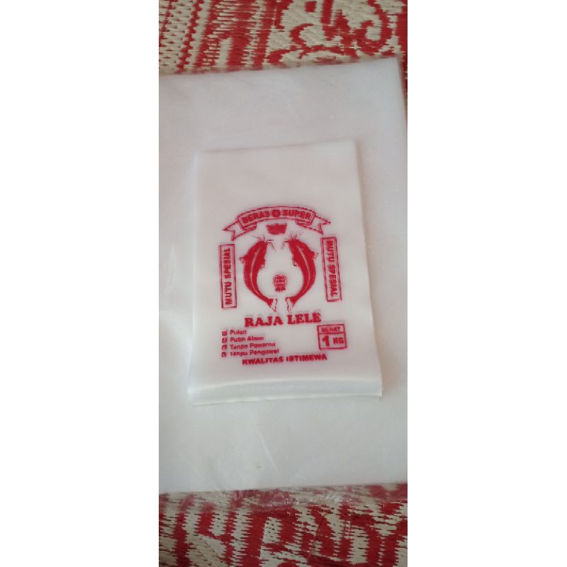 plastik beras 1 kg raja lele isi 100 lembar