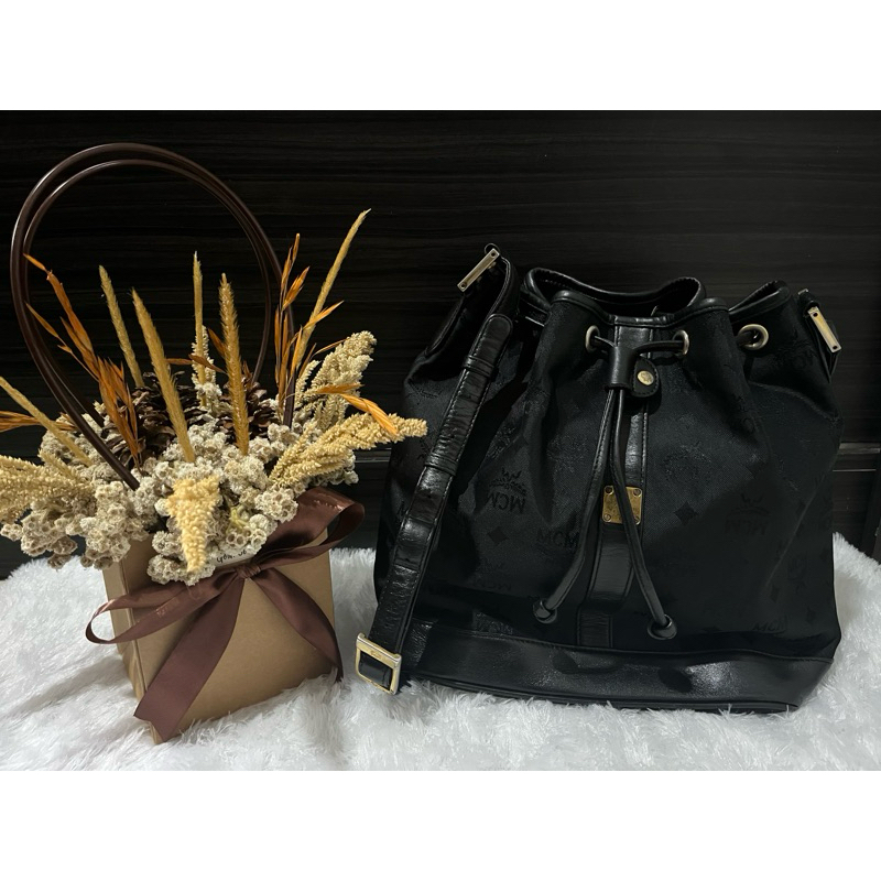 mcm drawstring bucket sling bag
