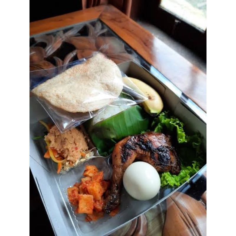

Nasi Box Ayam Bakar+buah+air mineral