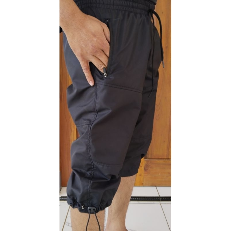 celana olahraga pria wanita 7/8 pinggang karet big size menyerap keringat