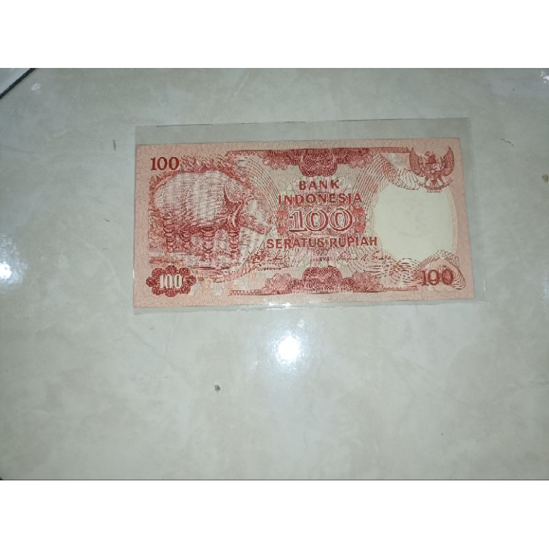 uang 100 / seratus rupiah badak tahun 1977 asli unc