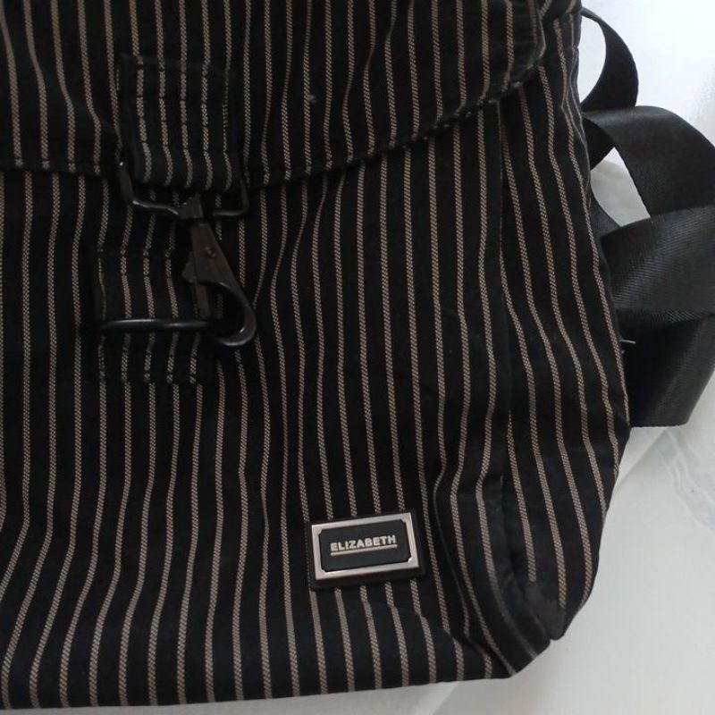 Tas Ransel Elizabeth warna hitam garis kuning,ukuran 27×20