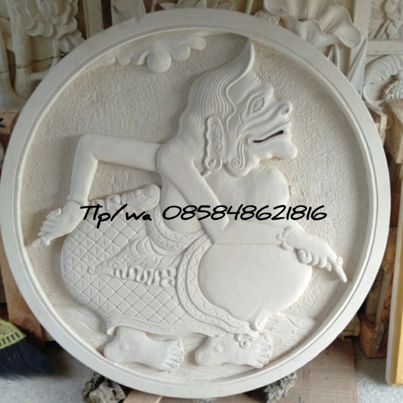 ukiran batu alam motif wayang semar