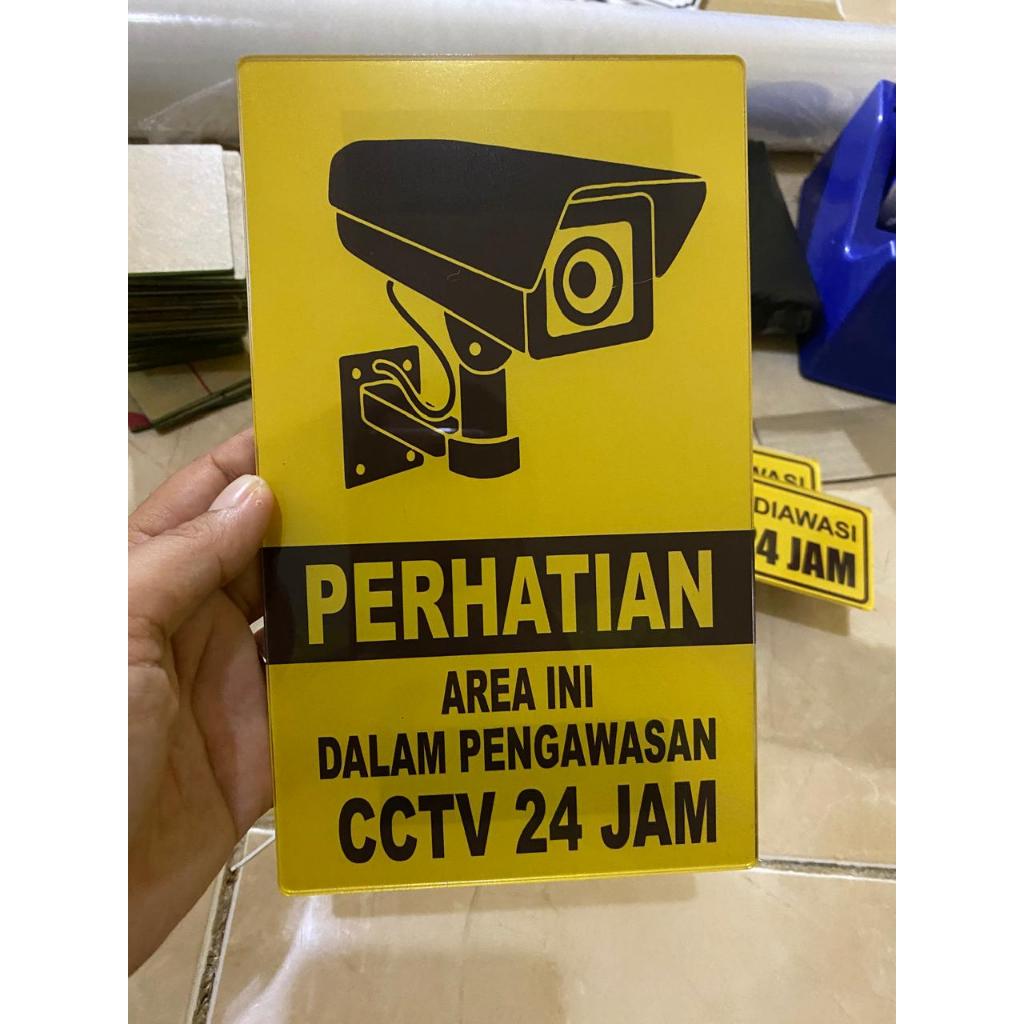 

stiker / akrilik perhatian area ini dalam pengawasan cctv 24 jam