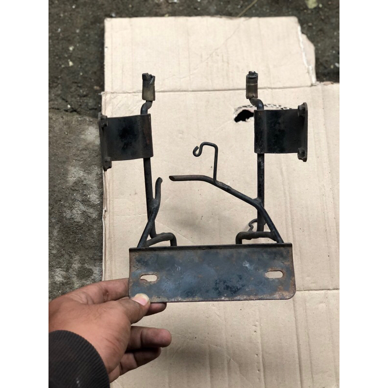 BREKET LAMPU DEPAN MEGAPRO PRIMUS PANGKON LAMPU DEPAN MEGAPRO PRIMUS ORIGINAL COPOTAN
