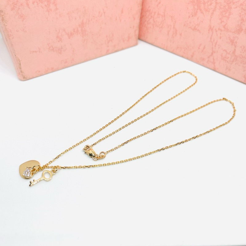 Kalung dewasa emas 375 liontin kunci