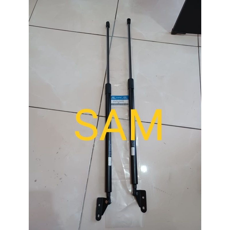 SHOCK HIDROLIK BAGASI BELAKANG KIA TRAVELLO