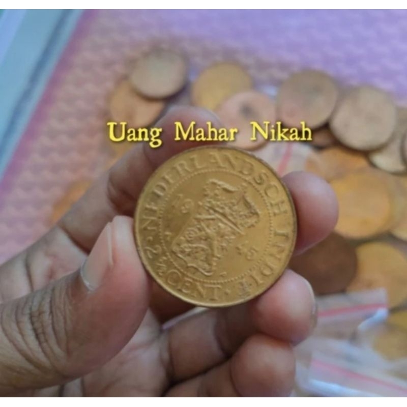 koin benggol 2,5 cent nederlandsch indie . Koin kerokan