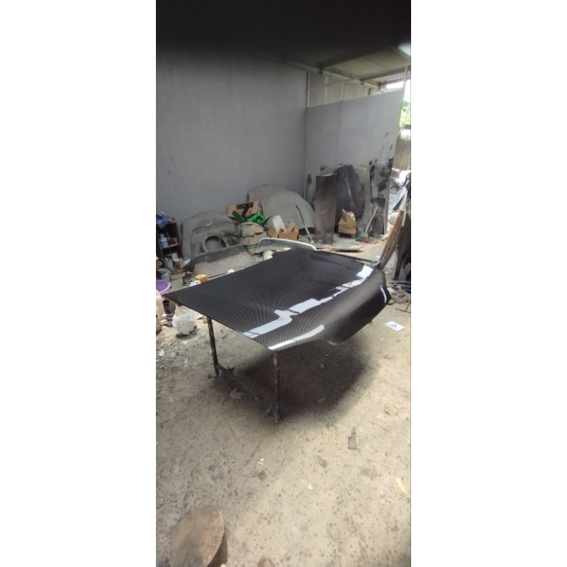 kap mesin Genio carbon