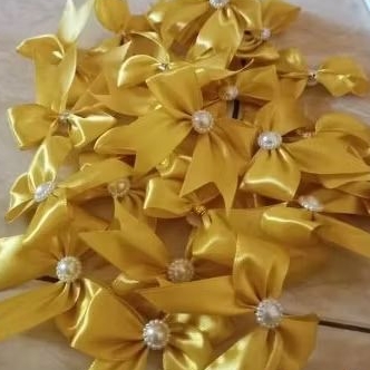 

pita tempel souvenir ukuran pita 2.5cm isi 25 biji