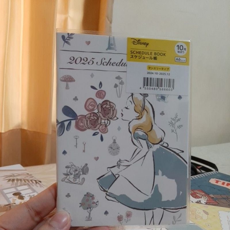 

Agenda Planner Disney Alice in Wonderland 2025 Schedule Book.