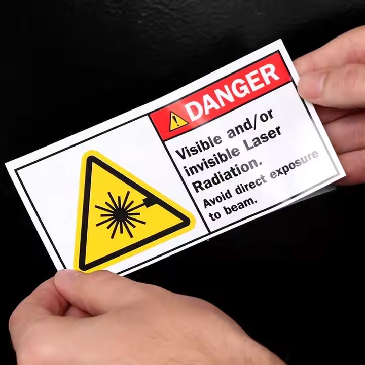 

STIKER VINYL LASER RADIATION HAZARD / AWAS BAHAYA LASER