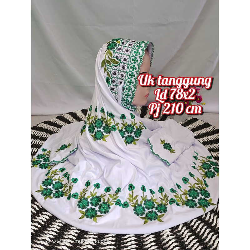 mukena terusan warna putih motif bunga