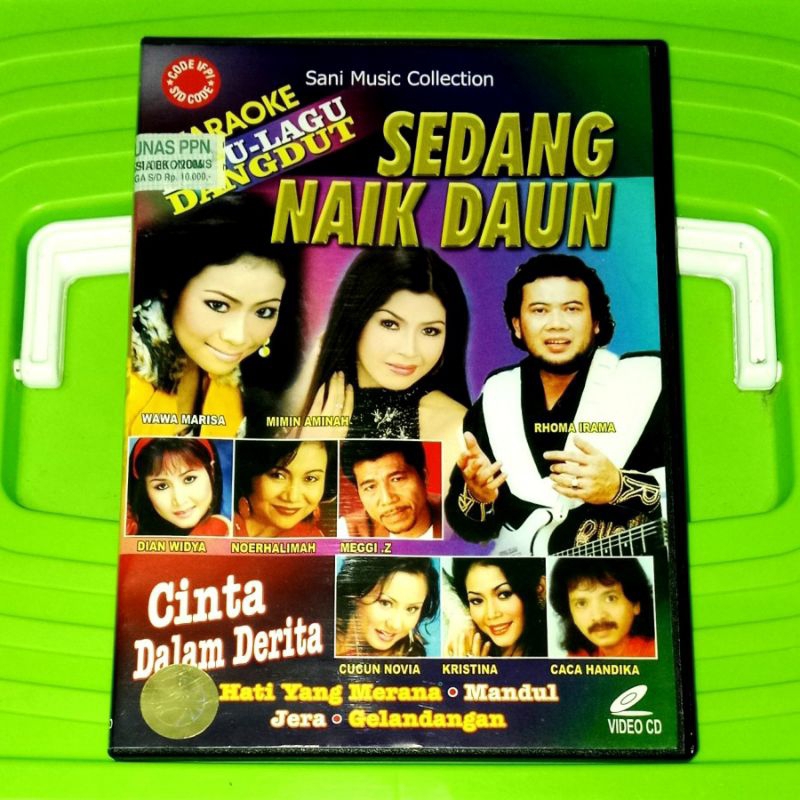 VCD KARAOKE LAGU-LAGU DANGDUT SEDANG NAIK DAUN Wawa Marisa Mimin Aminah Meggi .Z Kristina Noerhalima