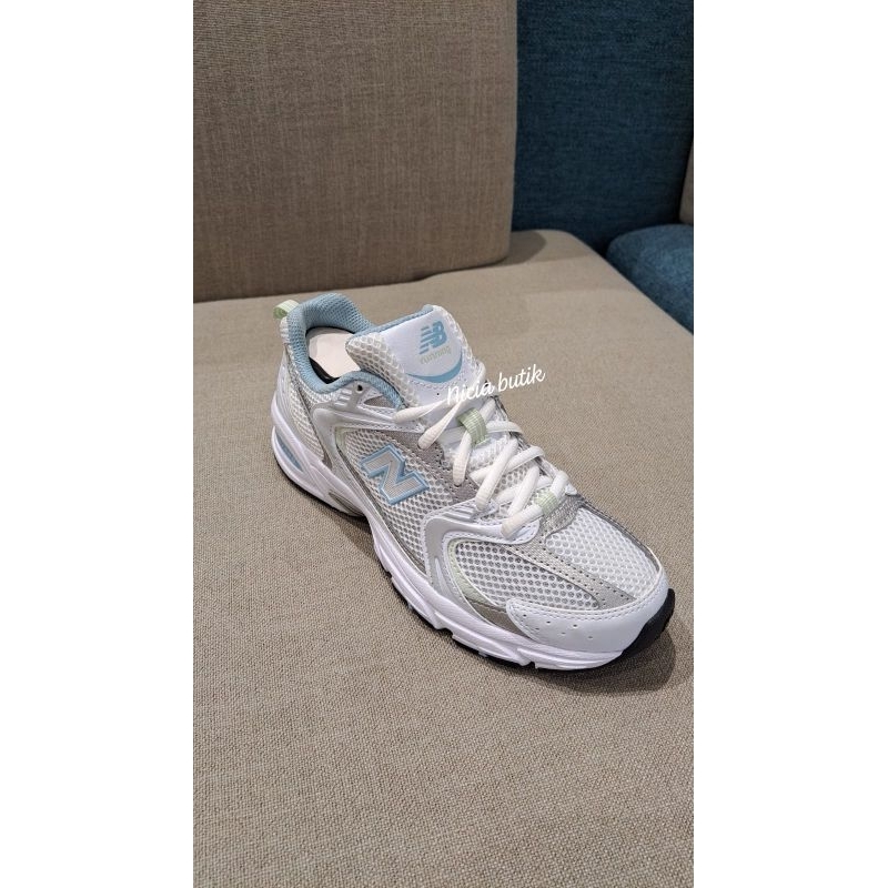 sepatu nb 530 whiteblue