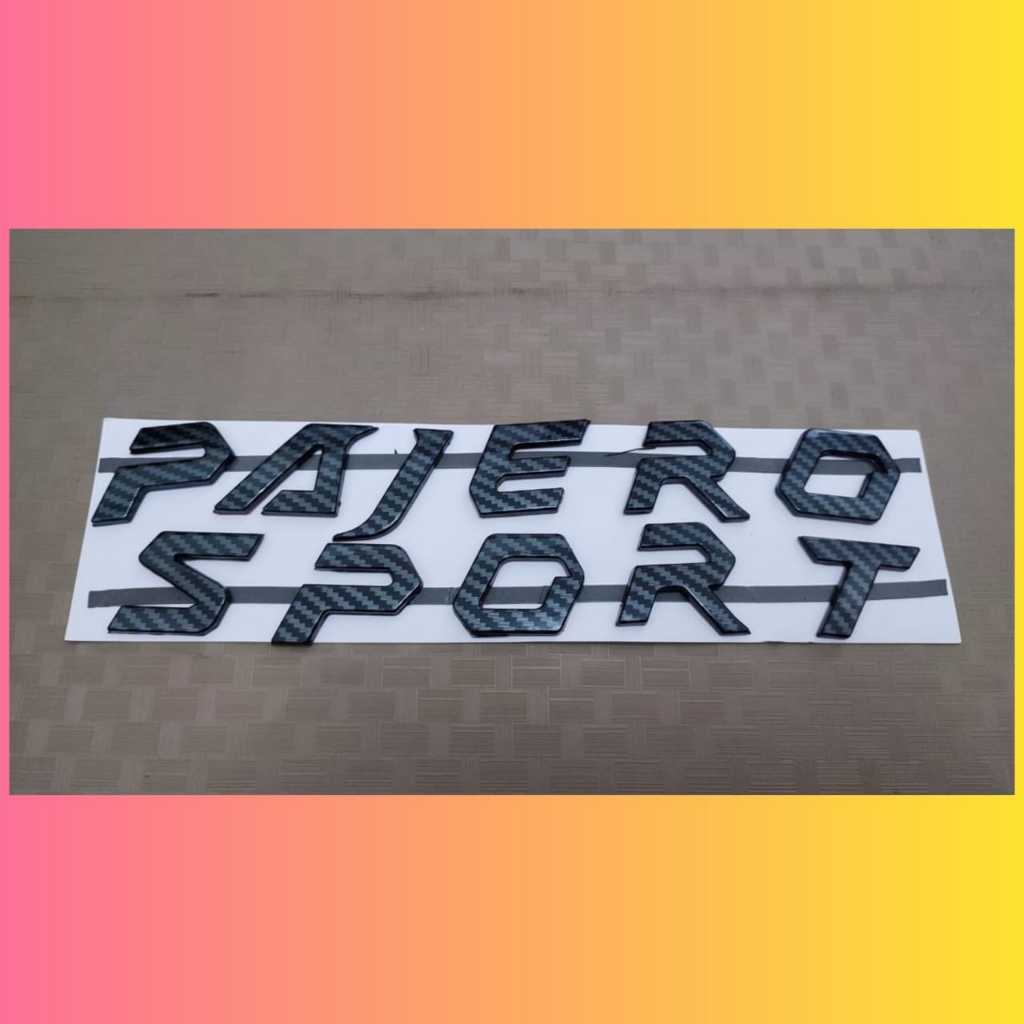 emblem kap mesin tulisan pajero sport warna carbon