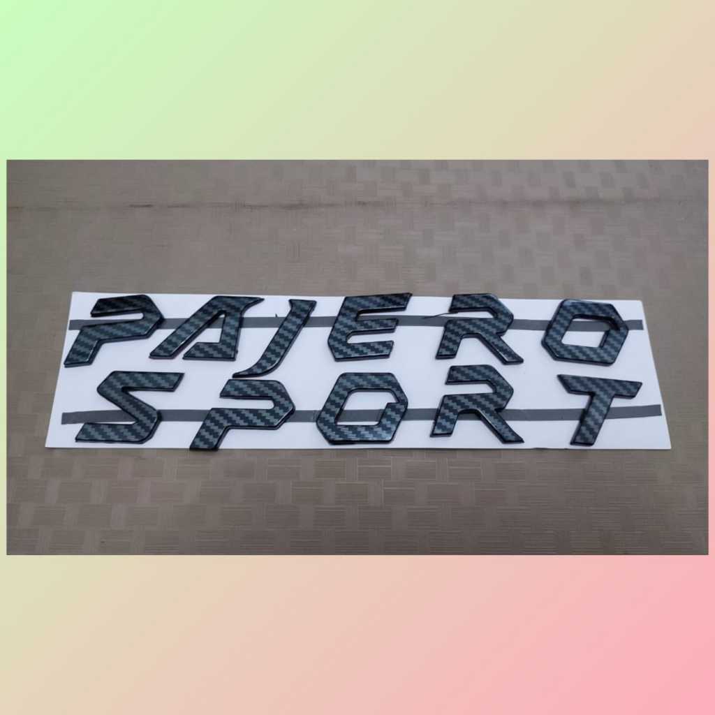 emblem kap mesin tulisan pajero sport warna carbon