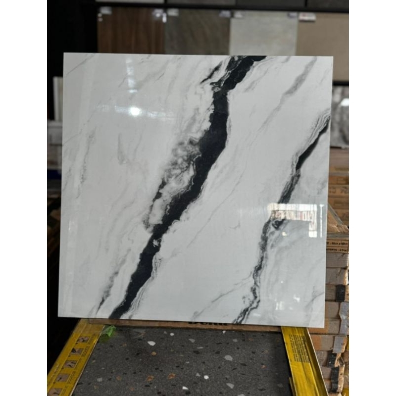 granit lantai 60x60 motif carara Nero Glazed polished