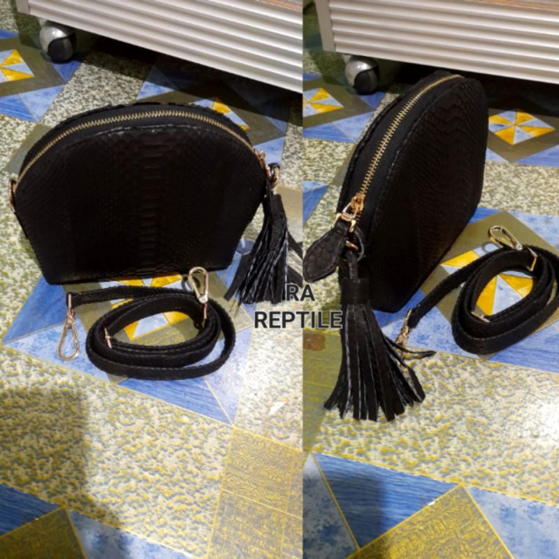 tas oval kulit ular