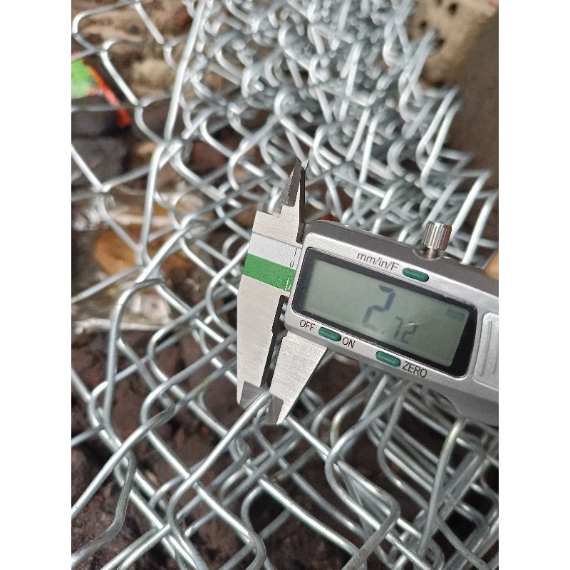 Kawat harmonika galvanis Bwg-12 (tebal 2,7mili diameter lubang 5cm)