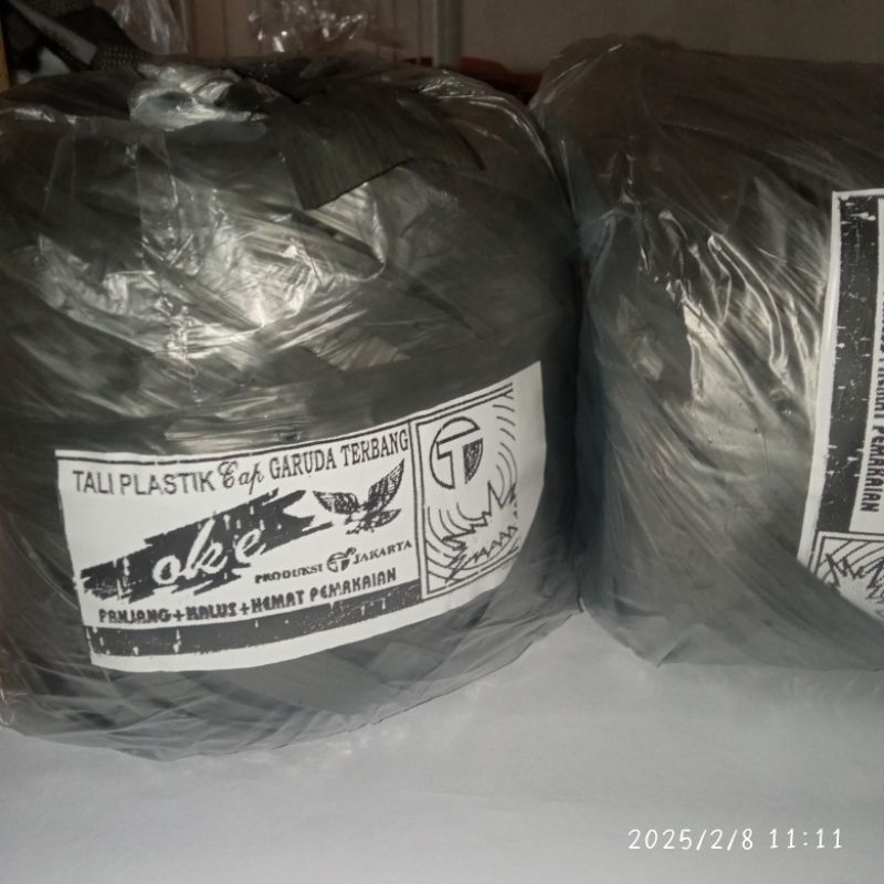 

Tali Rafia Hitam cap GARUDA TERBANG