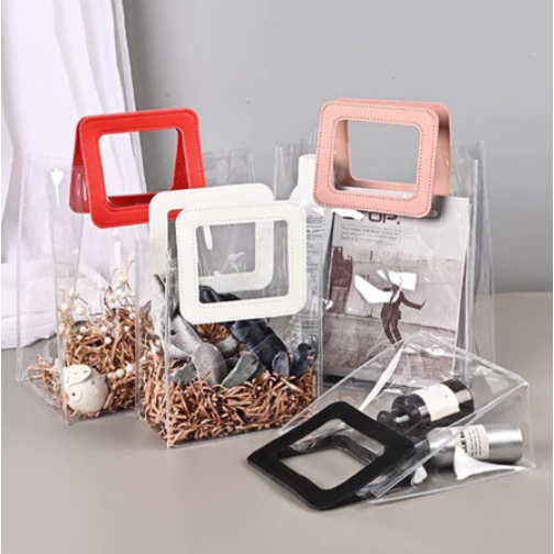 

EXTRA TEBAL TAS MIKA SOUVENIR HANDLE KULIT PVC TRANSPARAN BENING / TAS GOODIE BAG TOTE BAG TAS KADO HADIAH MEWAH TAS PARCEL HANDLE LEATHER PREMIUM