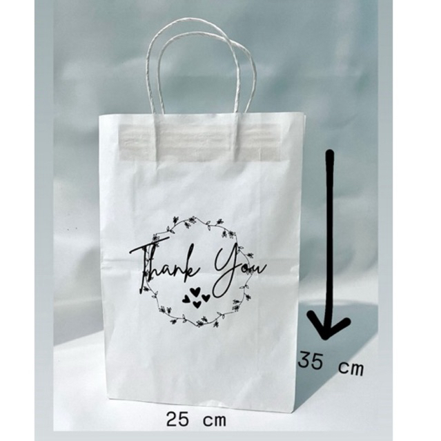 

PAPER BAG PUTIH SABLON FOLIO 35x10x25 CM