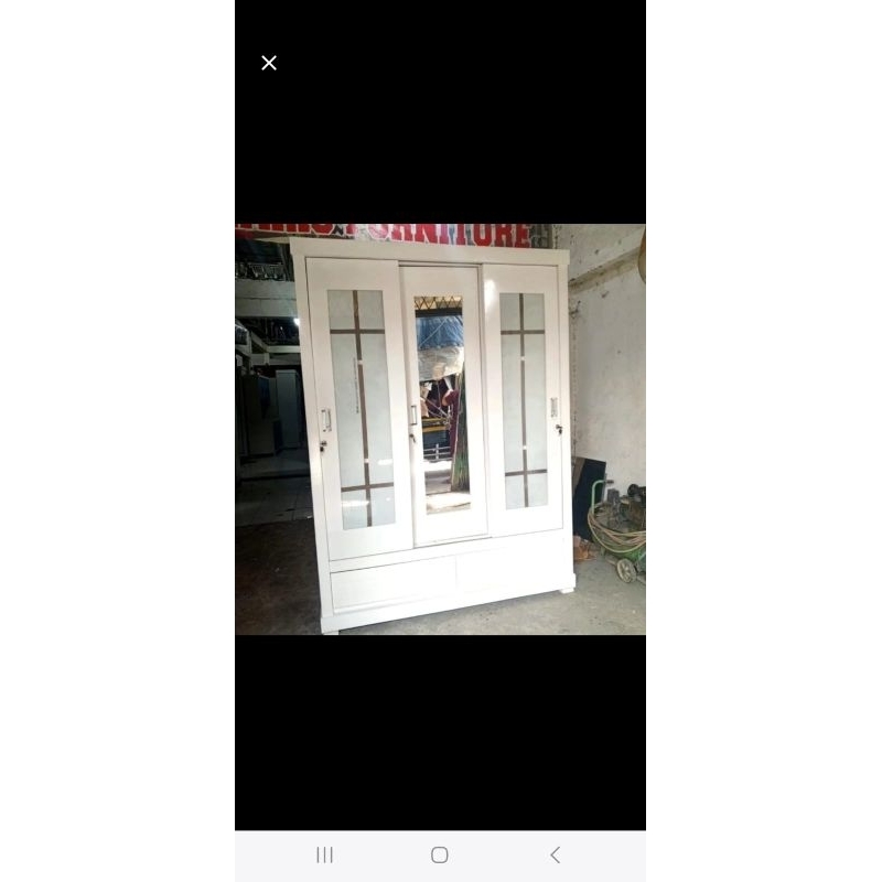 lemari sliding 3 pintu minimalis handle tanam