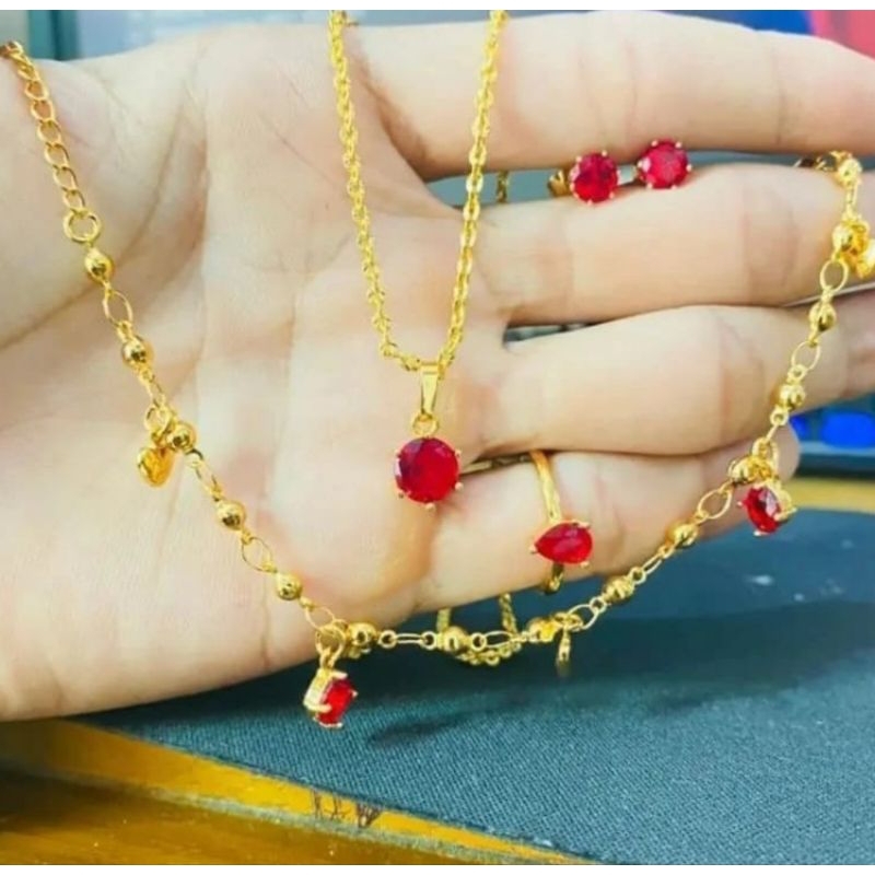 SET PERHIASAN WANITA LIONTIN MATA MERAH DELIMA TITANIUM FASHION