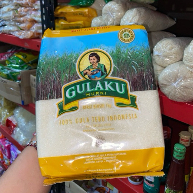

Gula pasir GULAKU kuning 1kg