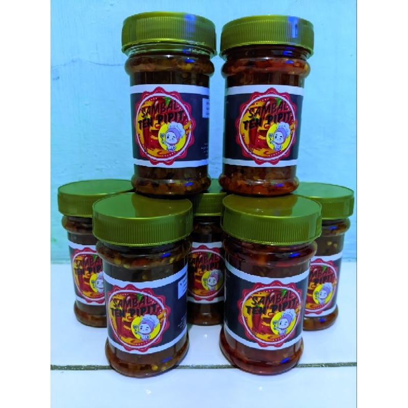 

Sambal baby cumi, teri, dan bawang dengan level pedas