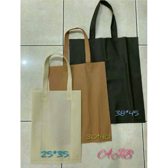 

Lusinan 12 pcs goodie bag 3x45x1 tas kain spundbond 12 pcs