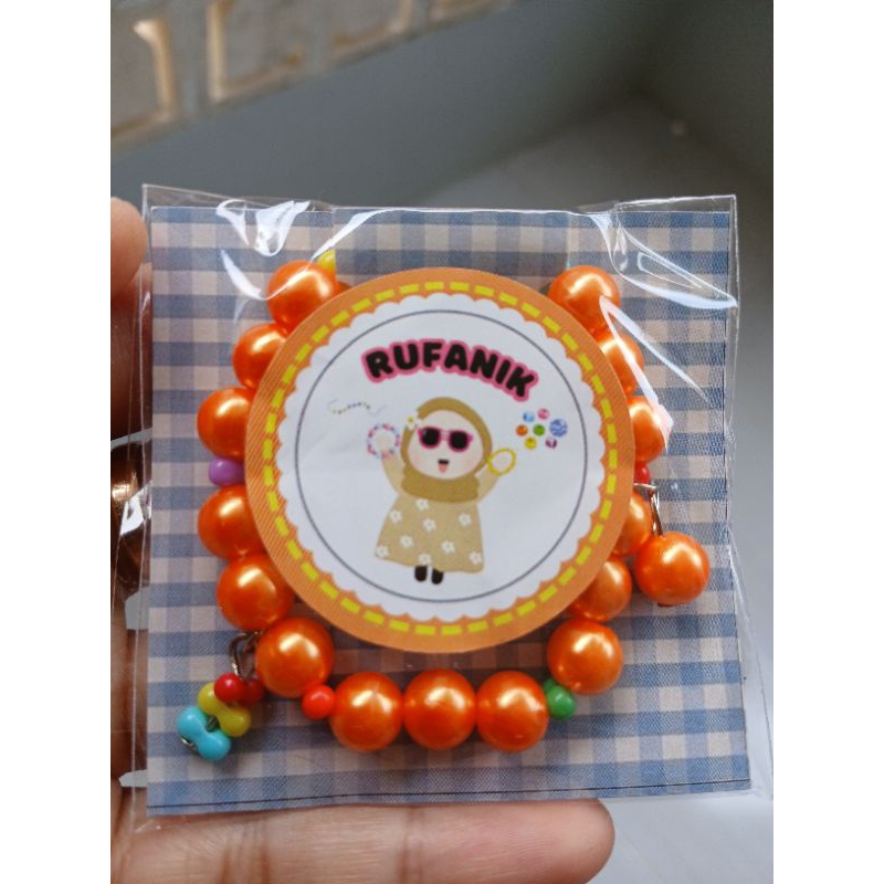 Gelang Mutiara Orange berhias Manik Kacang dan Bandul