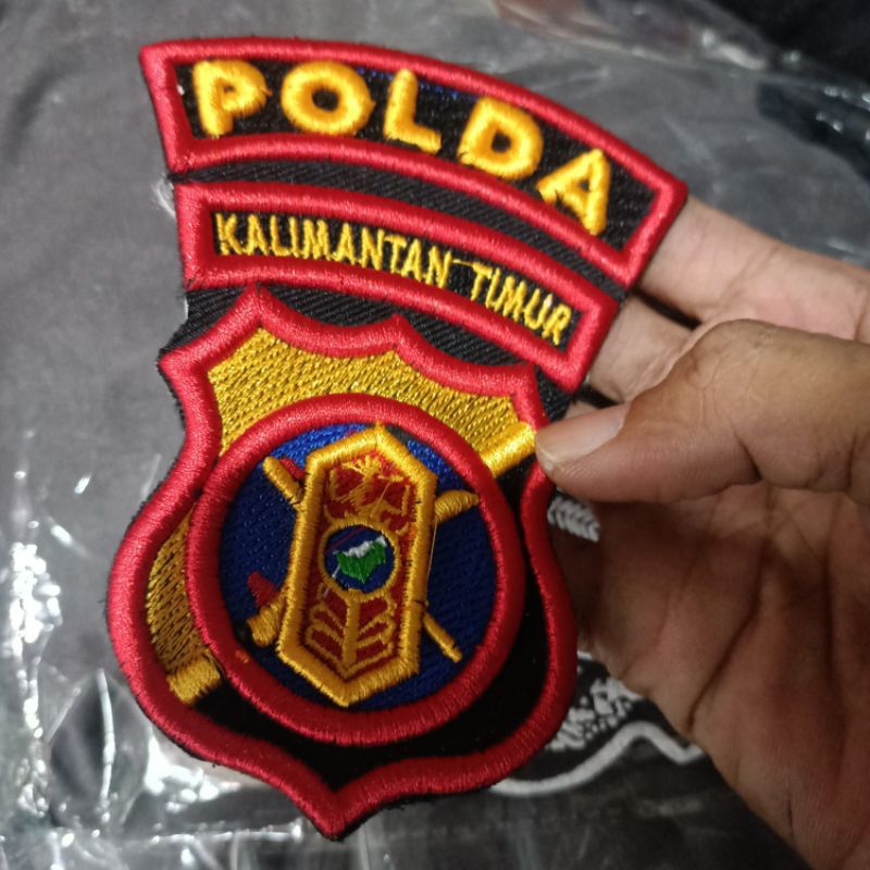 bordiran lambang Polda Kalimantan timur